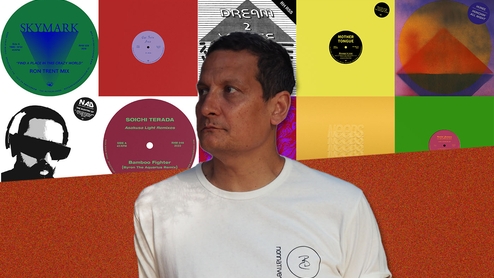 Press shot of Antal in front of 10 packshots of releases on his Rush Hour label