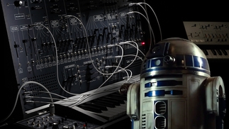 Photo of R2D2 standing next to a ARP 26000 FS