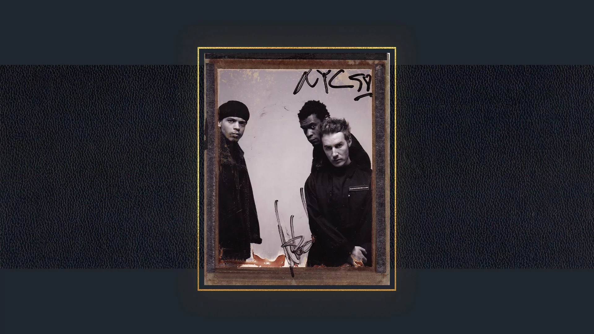 Black and white photo of Massive Attack in a frame, from 1998, on a dark blue background